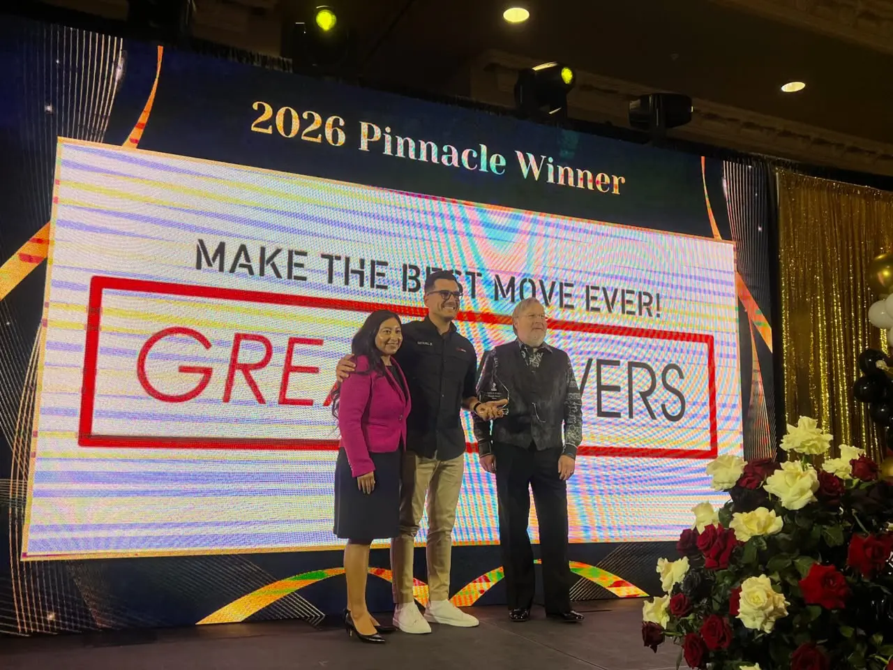 Great Movers accepting the 2026 Pinnacle award on stage at the BBB Awards for Excellence